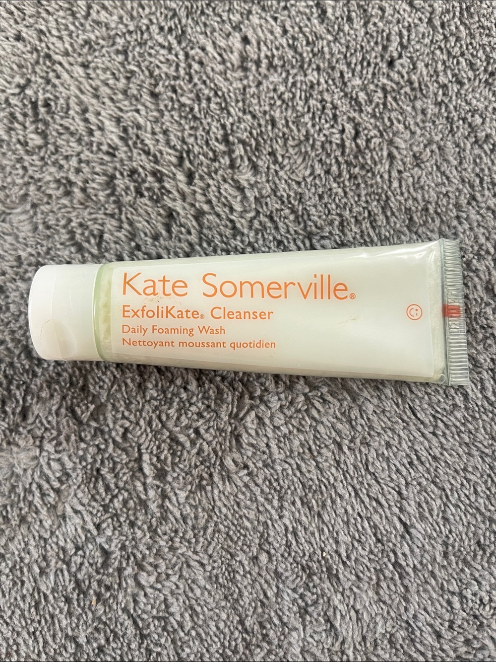Kate Somerville Daily Foaming Cleanser - White with Orange Logo